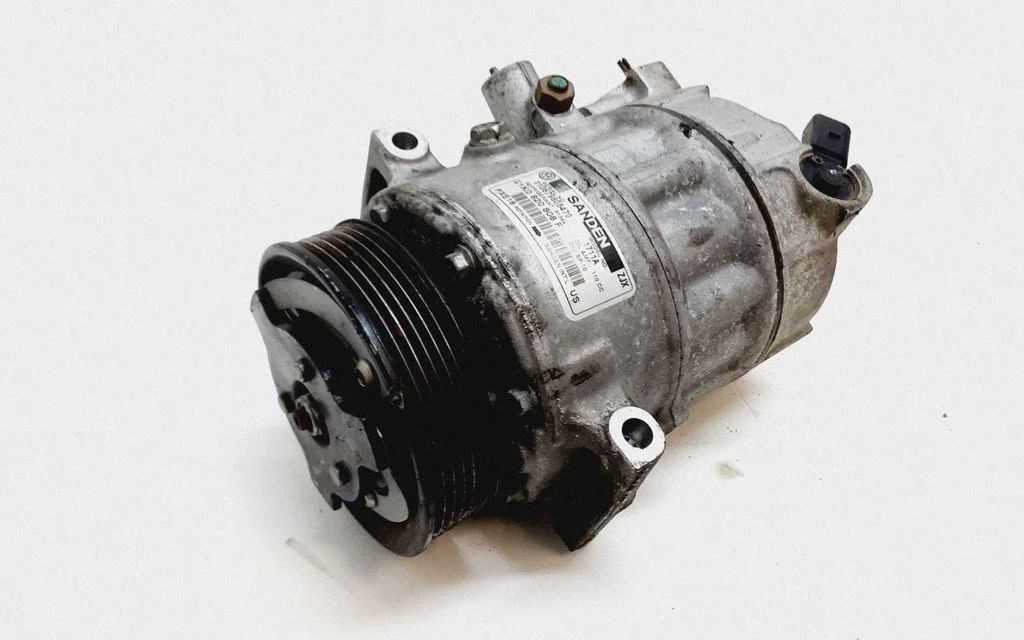 Air conditioning (A/C) compressor (pump) 6G9N6254AA