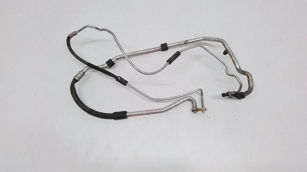 Air conditioning (A/C) pipe/hose – front