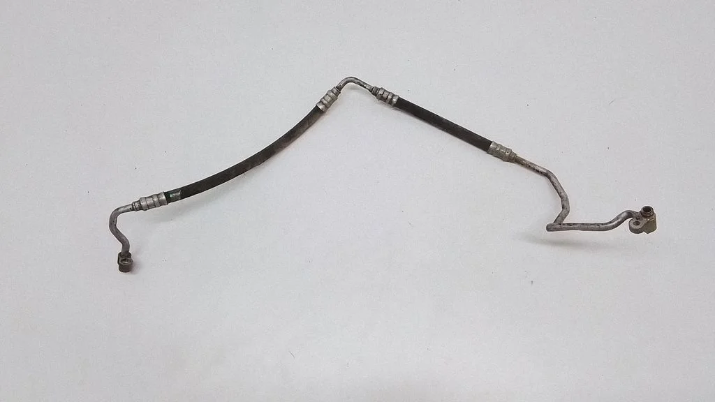 Air conditioning (A/C) pipe/hose – front