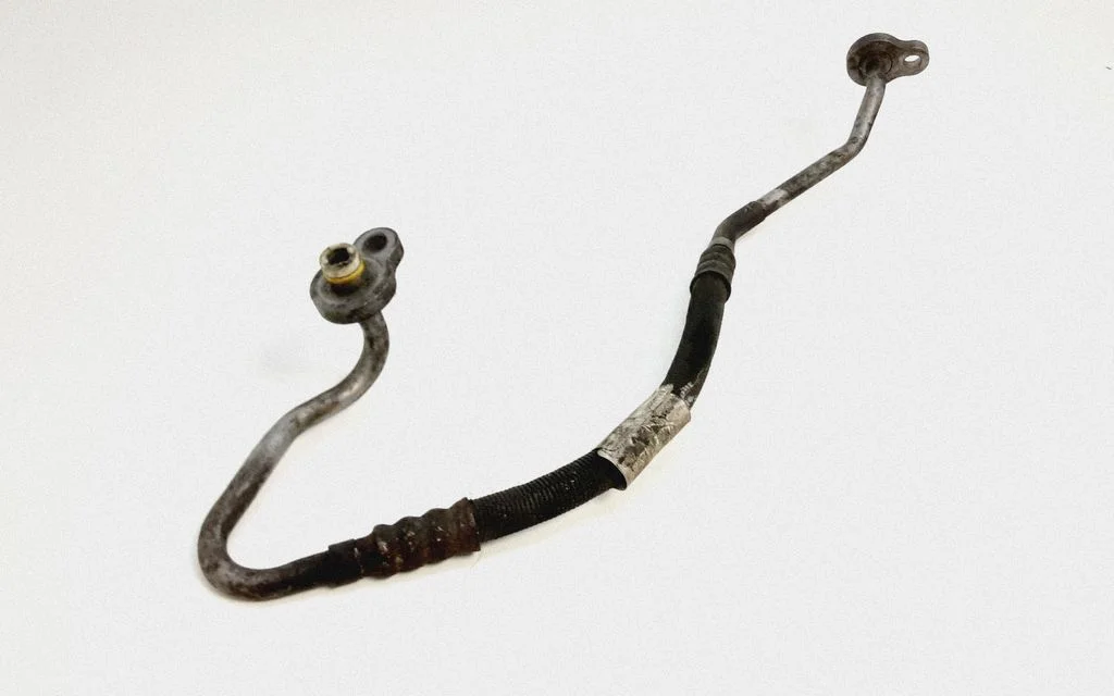 Air conditioning (A/C) pipe/hose 31315112
