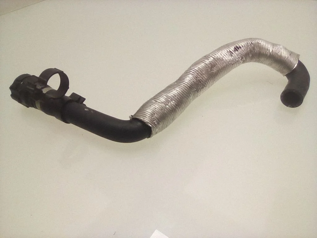 Engine coolant pipe/hose