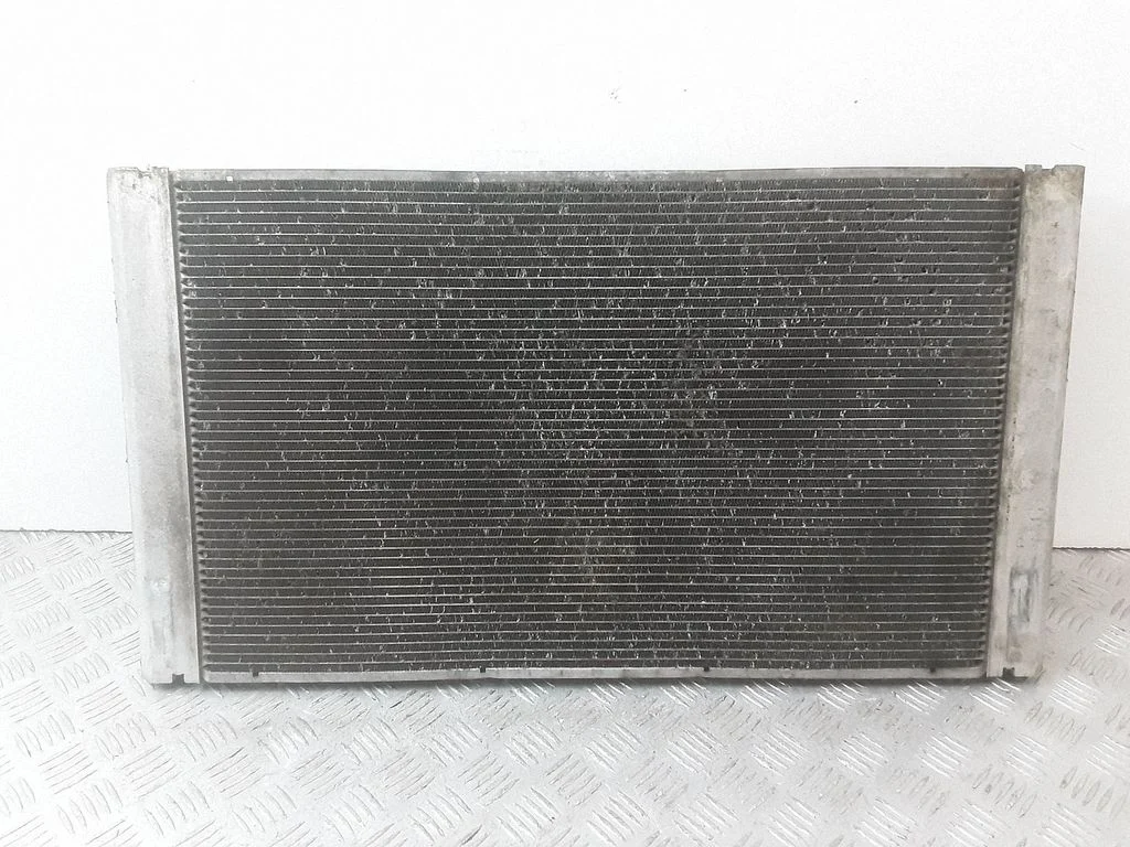 Coolant radiator 7795138