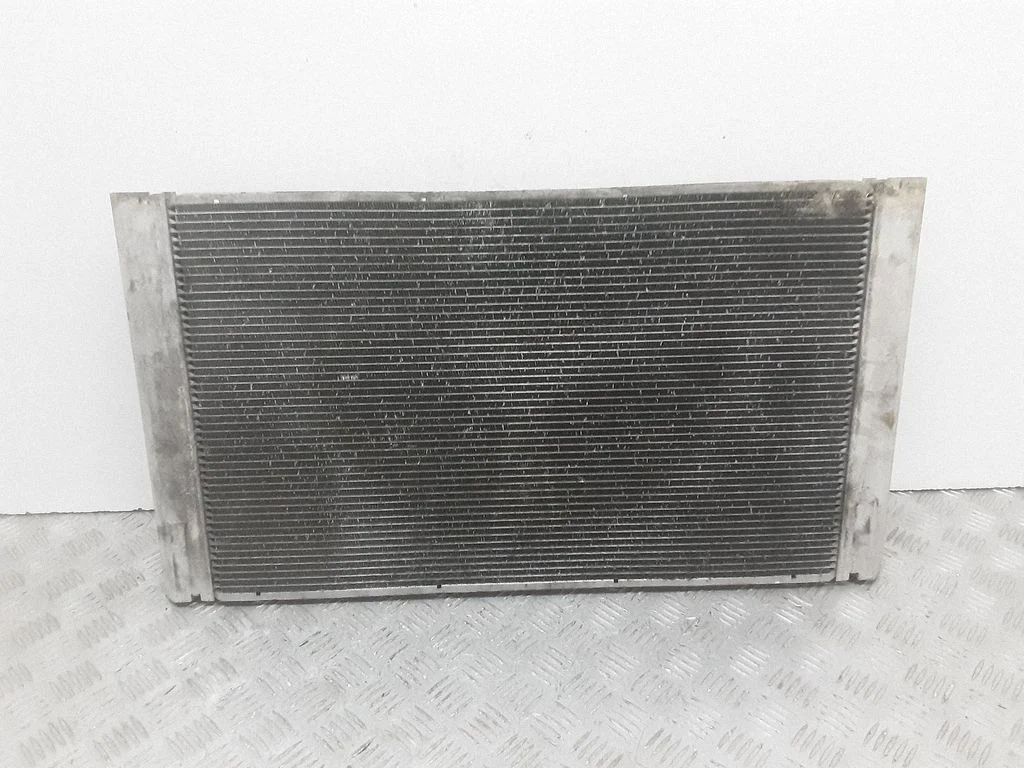 Coolant radiator 7795138