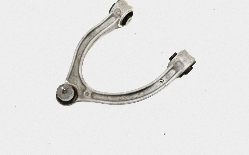 Front lower control arm/wishbone – front left