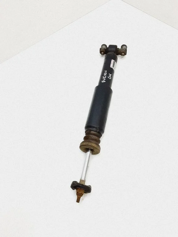 Rear shock absorber/damper DG9C18W002