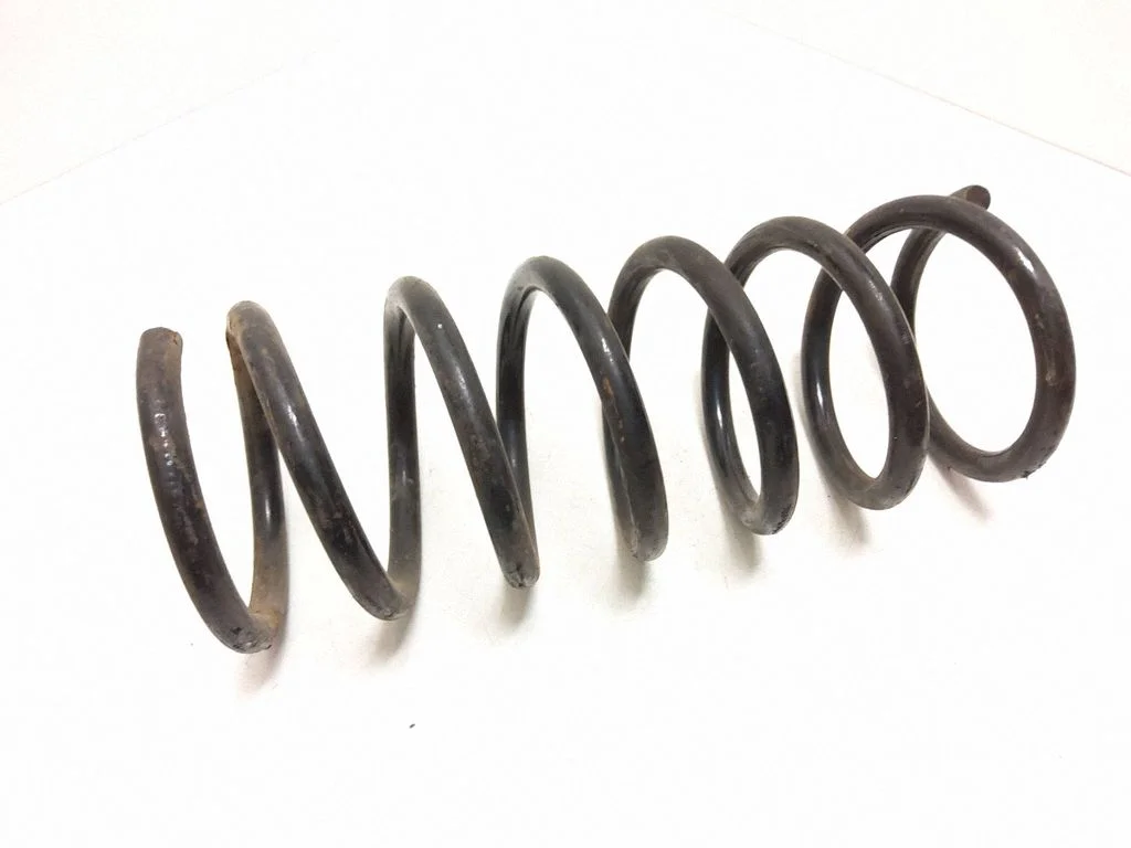 Rear coil spring – rear left