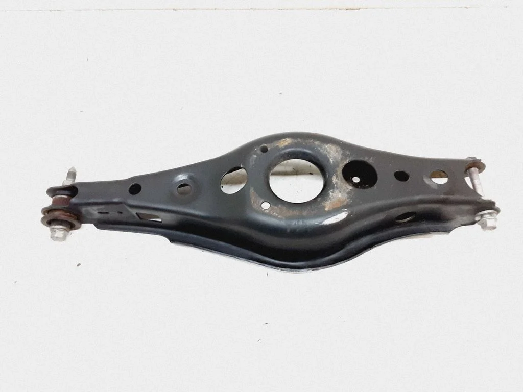 Rear upper control arm/wishbone – left
