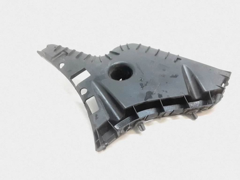 Rear bumper mounting bracket 31407893