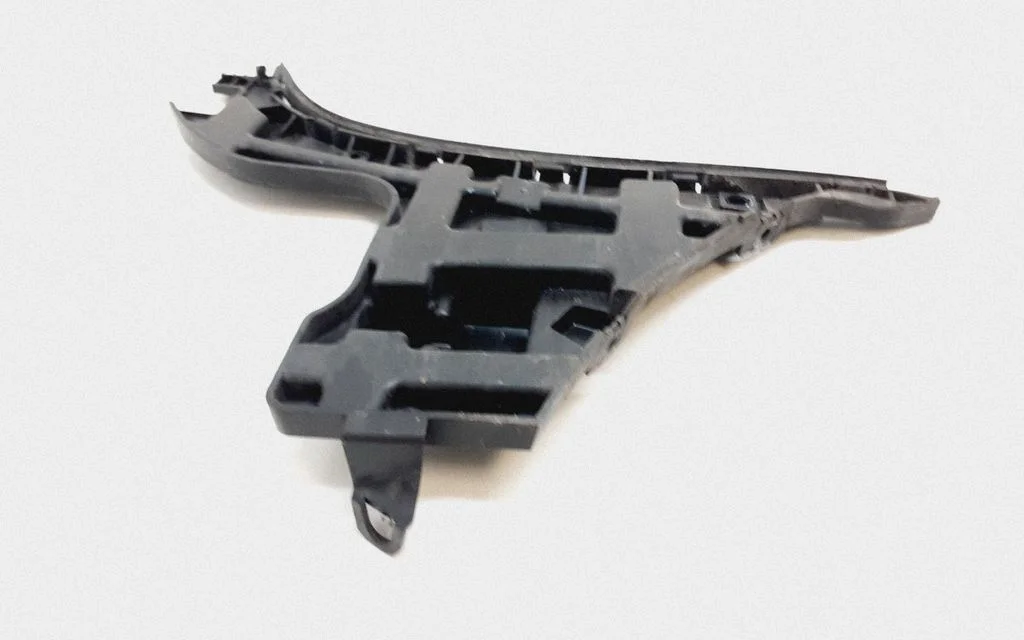 Rear bumper mounting bracket 31213294