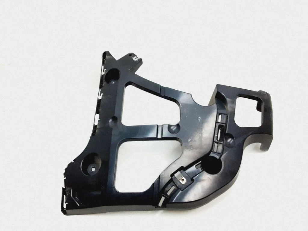 Rear bumper mounting bracket 7158445
