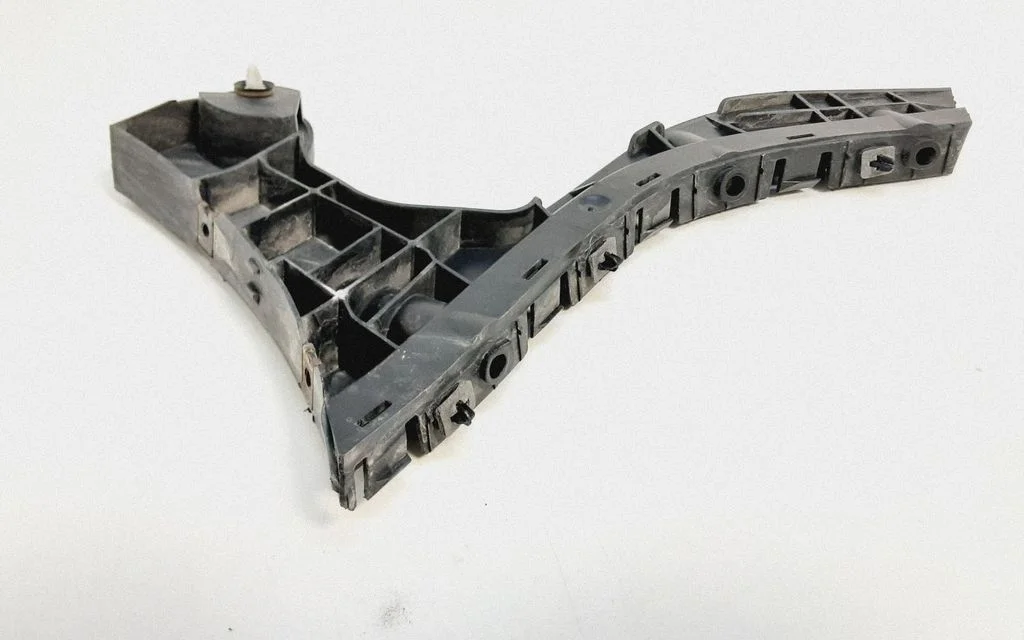 Rear bumper mounting bracket 30764697