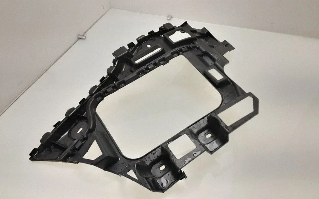 Rear bumper mounting bracket – rear left