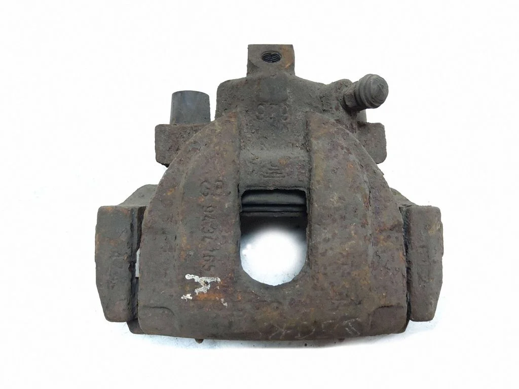 Rear brake caliper – left
