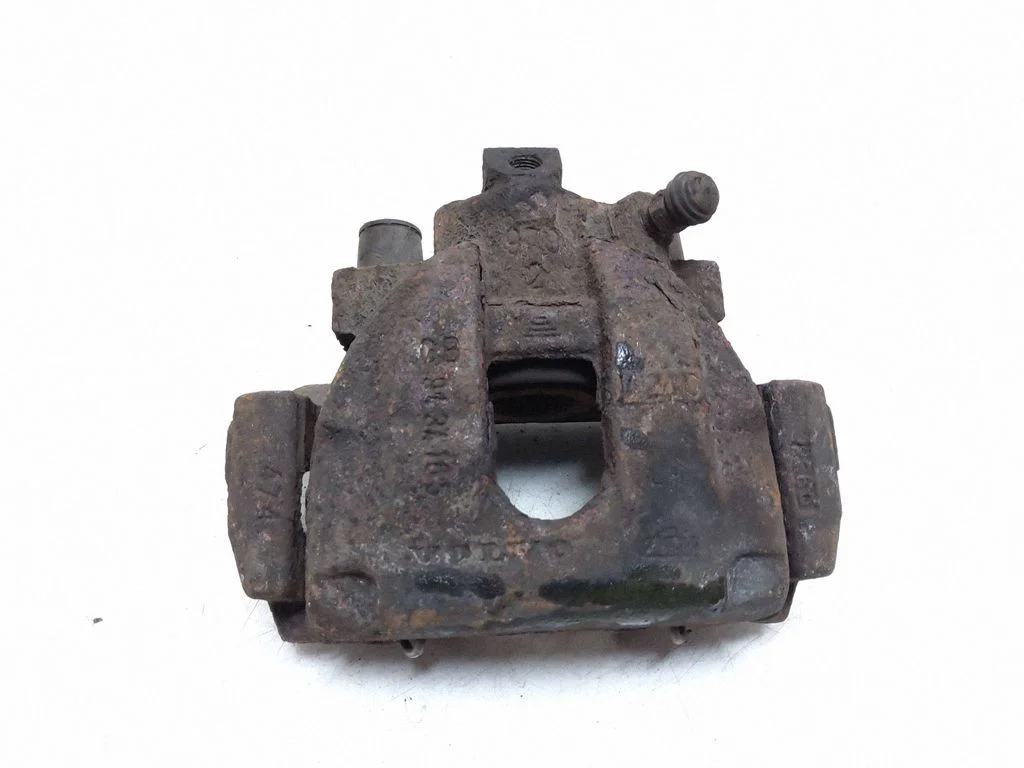 Rear brake caliper – left