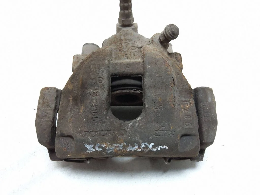Rear brake caliper – left