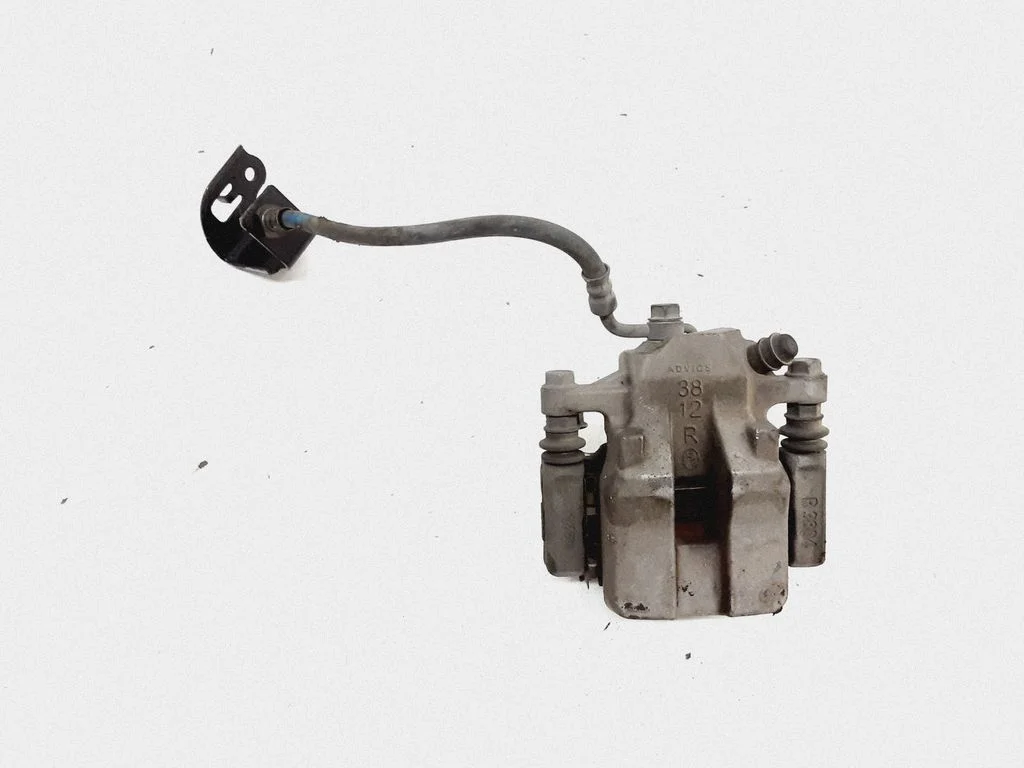 Rear brake caliper – right