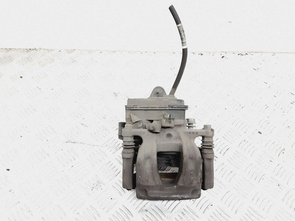 Rear brake caliper – right