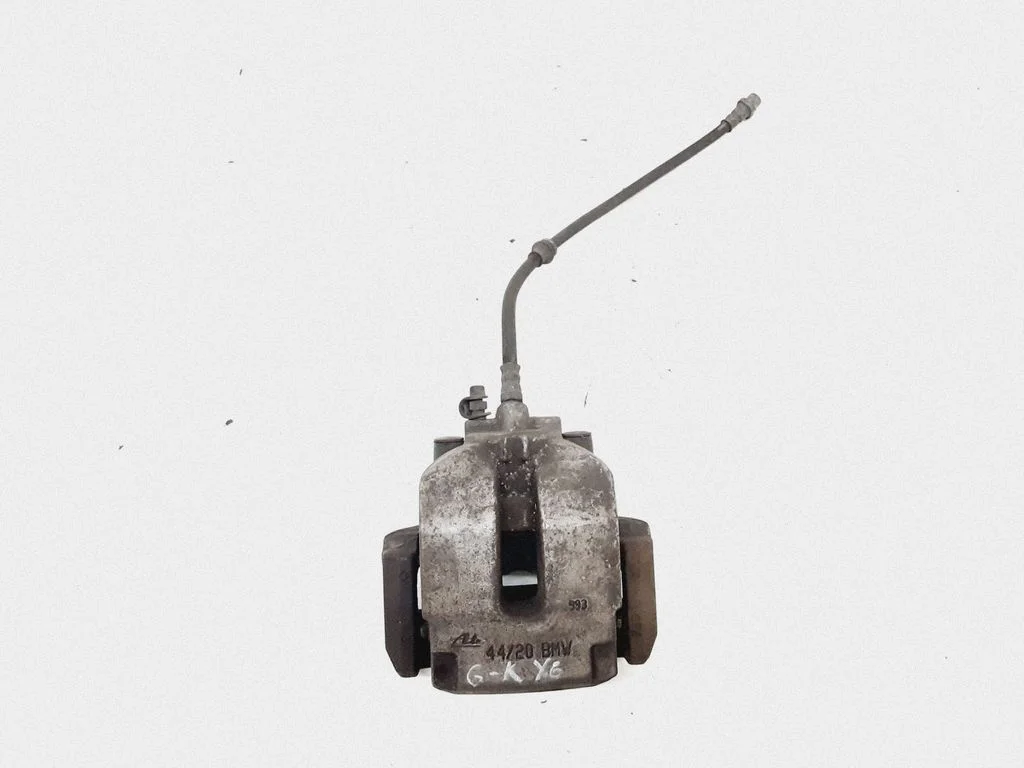 Rear brake caliper – left