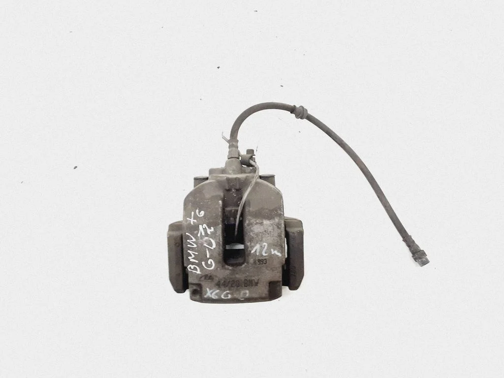 Rear brake caliper – right