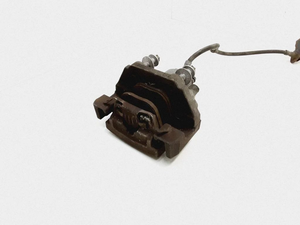 Rear brake caliper – rear left