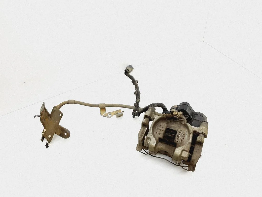 Rear brake caliper DG9C2D251K