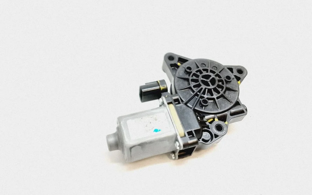 Front door window regulator motor
