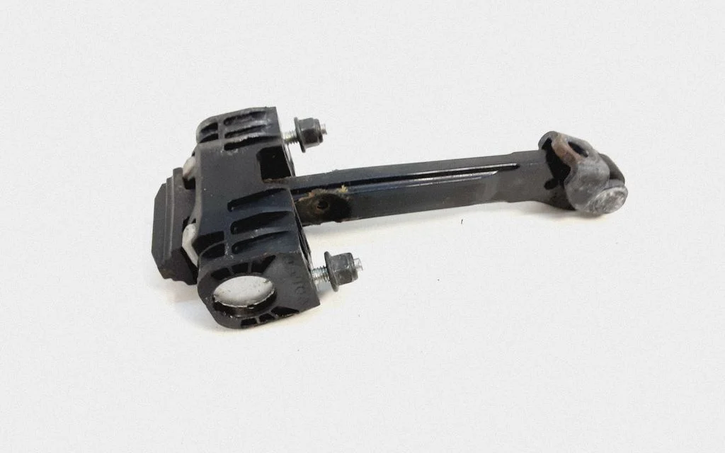 Rear door check strap stopper – Volvo XC60 (2009-2013)