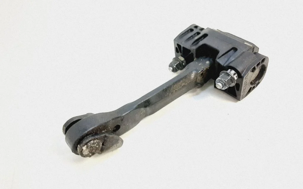 Rear door check strap stopper – Volvo XC60 (2009-2013)