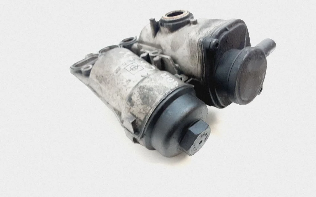 Oil filter mounting bracket 08642839