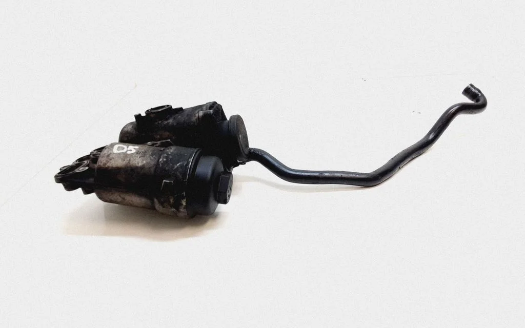 Oil filter mounting bracket – Volvo XC90 (2007-2014)