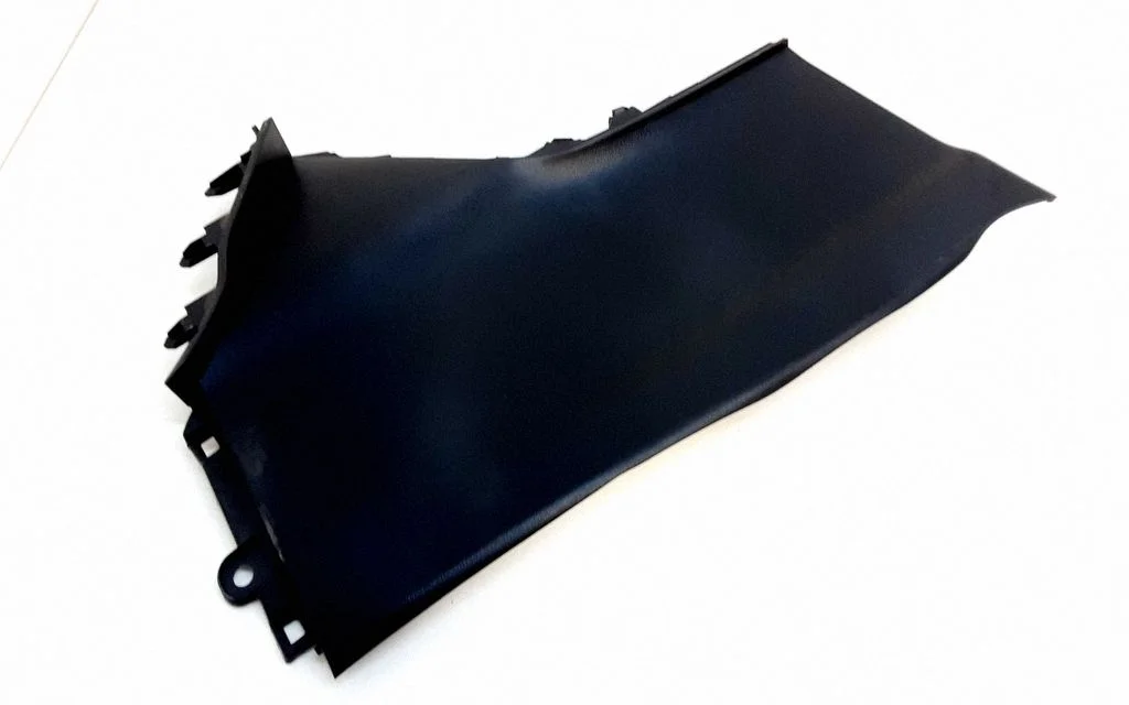 Centre console side trim front
