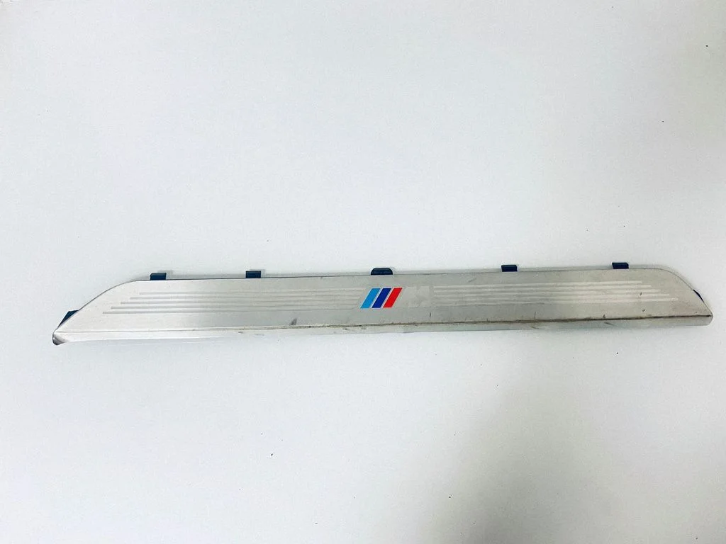 Front sill trim cover