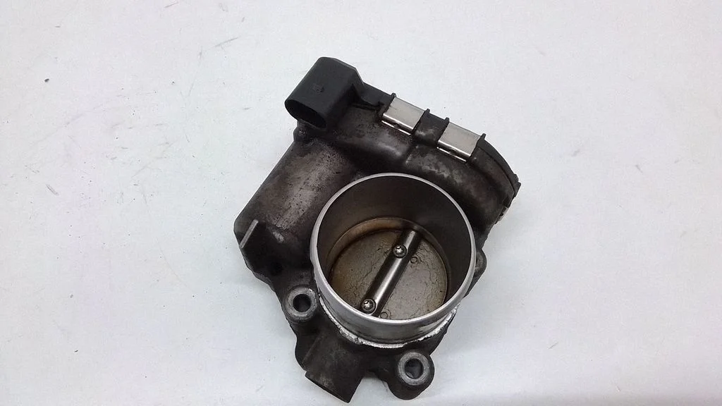 Throttle valve 7S7G9F991CA