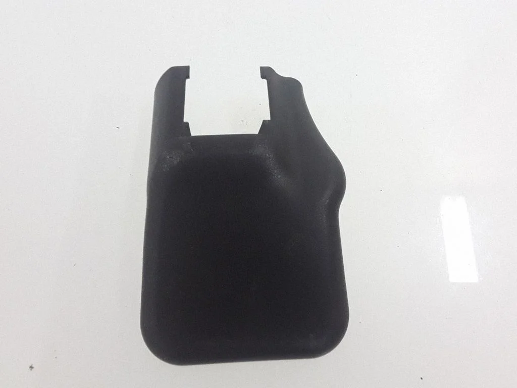 Front driver seat rail trim