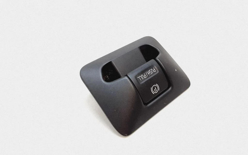 Hand parking brake switch – Volvo V70 (2005-2008)