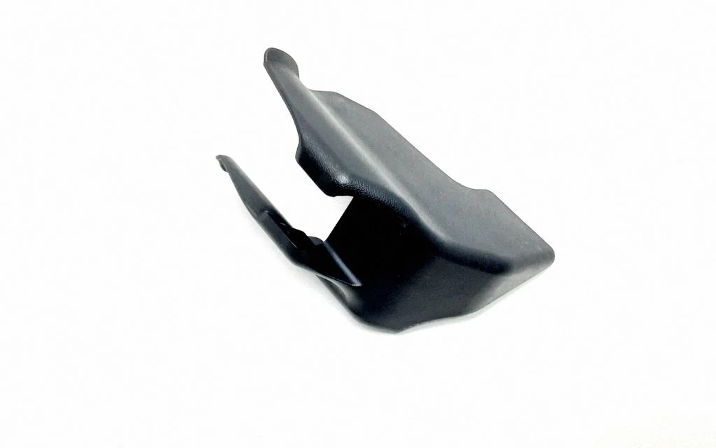 Rear seat rail trim cover
