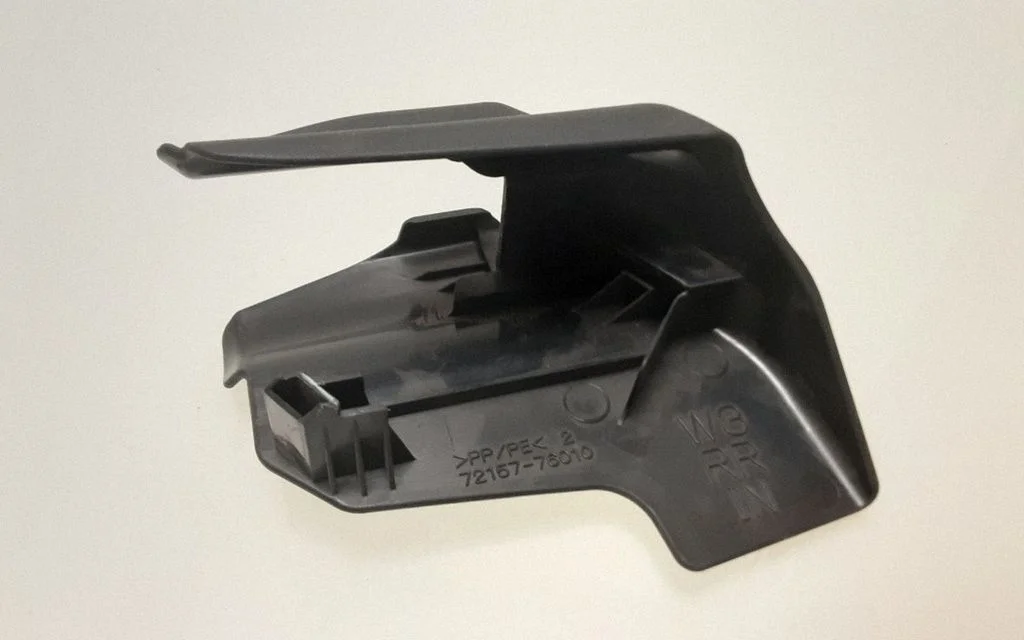 Rear seat rail trim cover