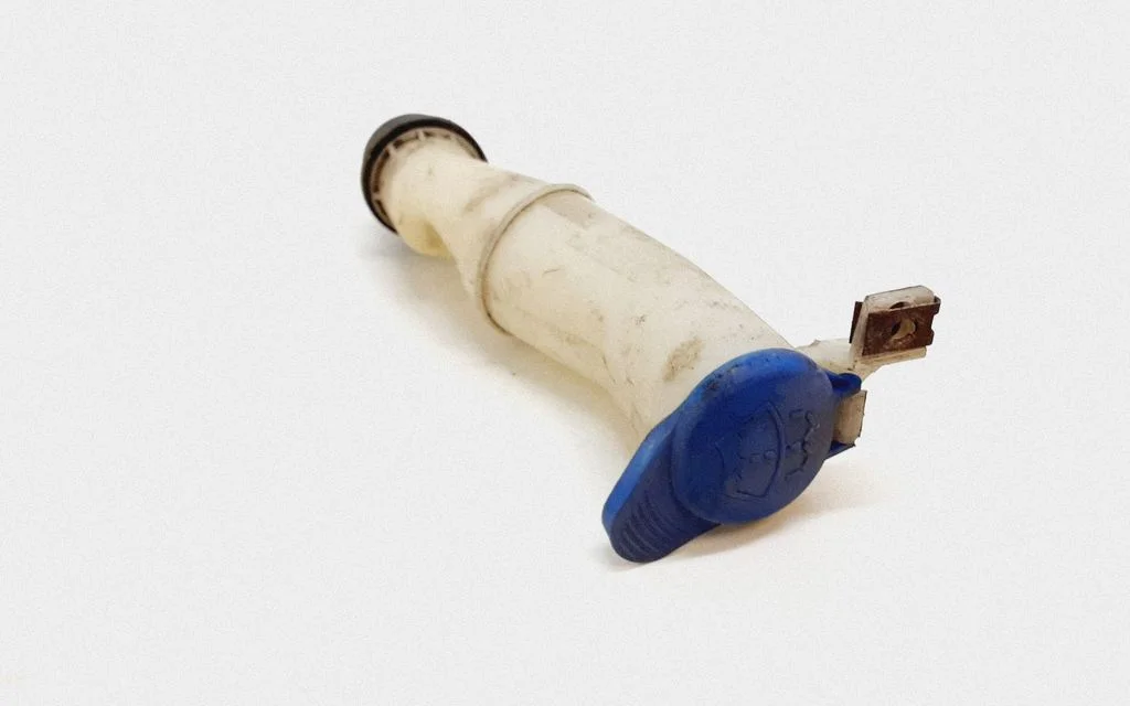 Window washer liquid tank fill tube – Volvo S60 (2005-2010)