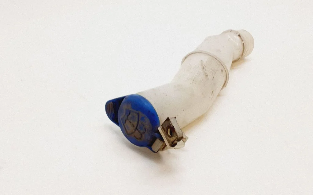 Window washer liquid tank fill tube – Volvo S60 (2005-2010)