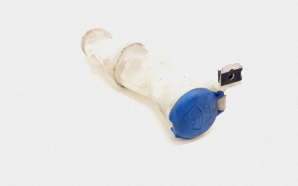 Window washer liquid tank fill tube – Volvo S60 (2005-2010)