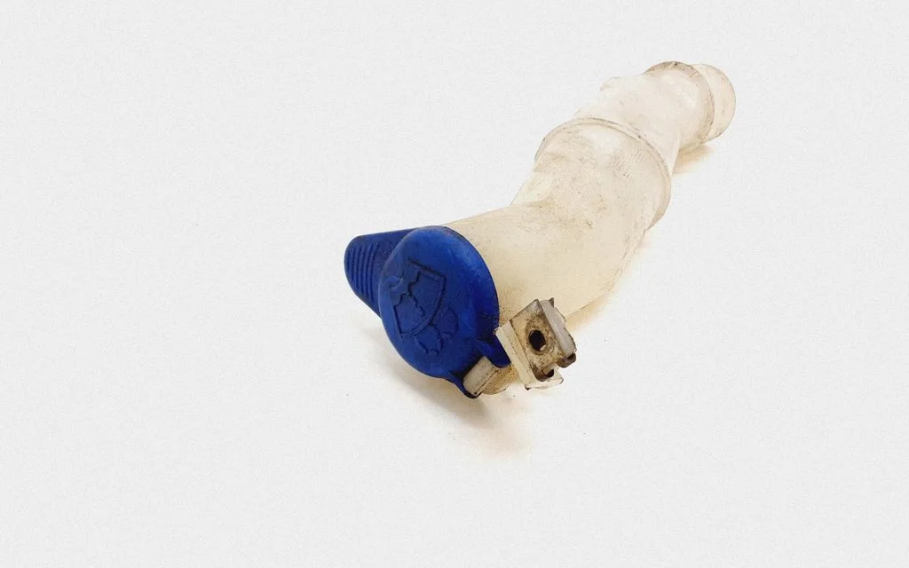 Window washer liquid tank fill tube – Volvo V70 (2000-2004)