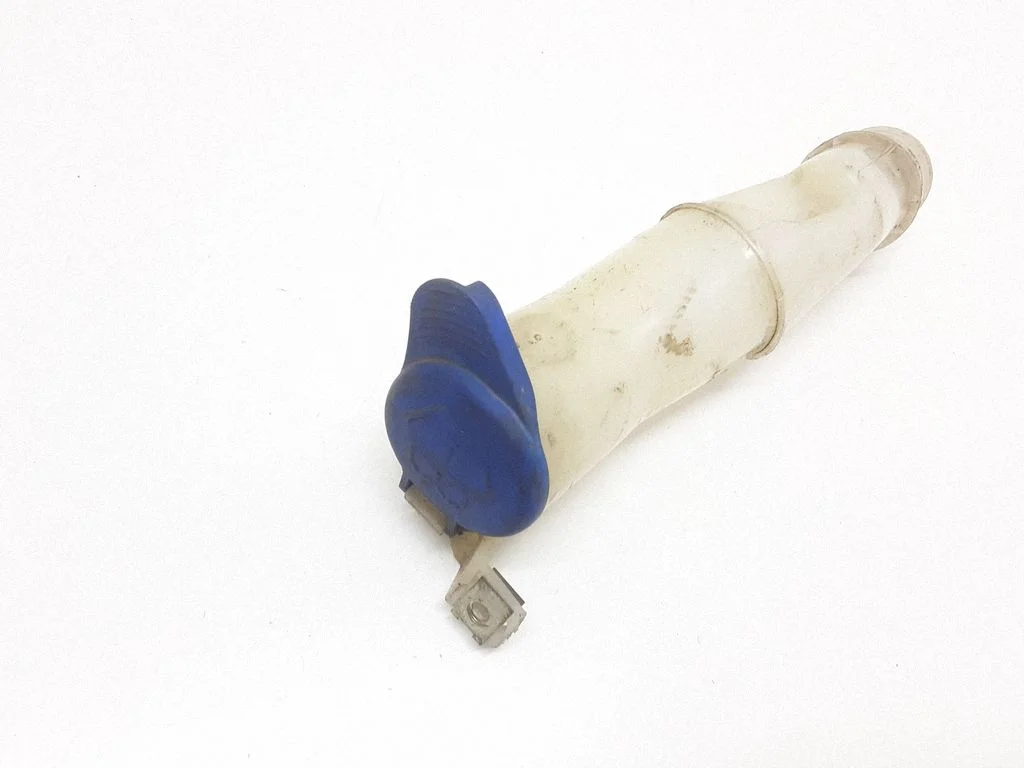 Window washer liquid tank fill tube – Volvo XC70 (2005-2007)