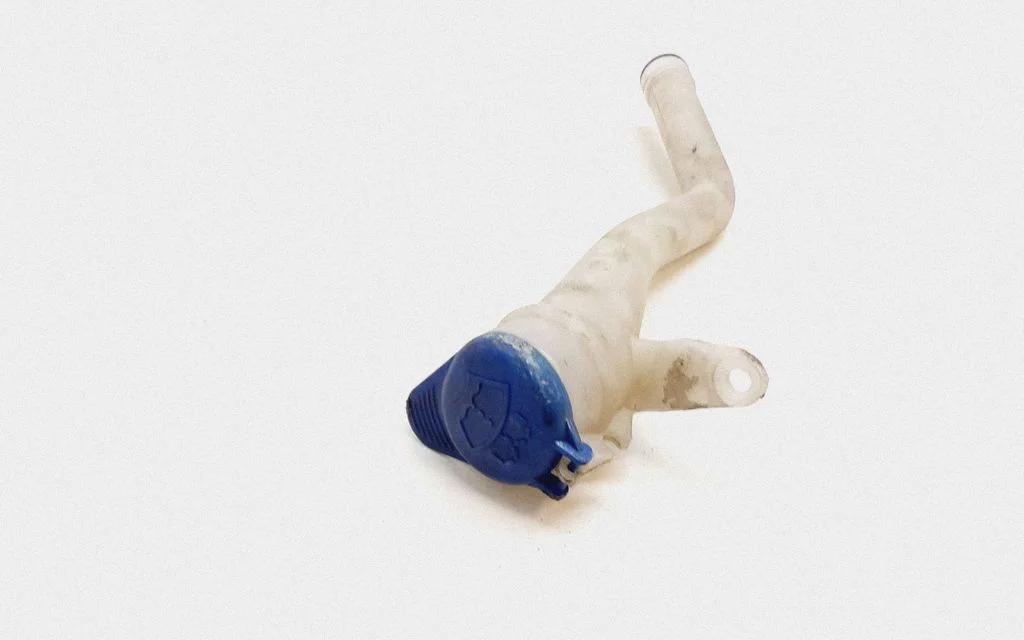 Window washer liquid tank fill tube – Volvo XC90 (2007-2014)