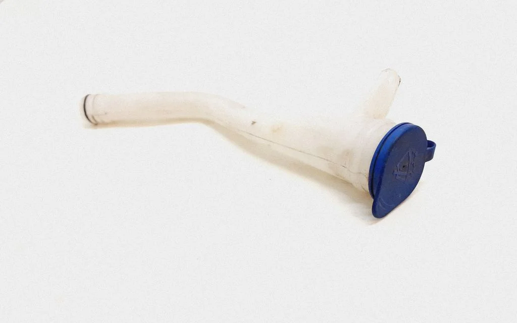 Window washer liquid tank fill tube – Volvo XC90 (2007-2014)