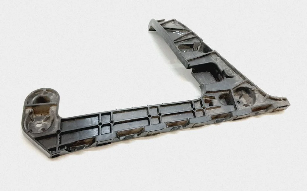 Rear bumper mounting bracket 8W9807453
