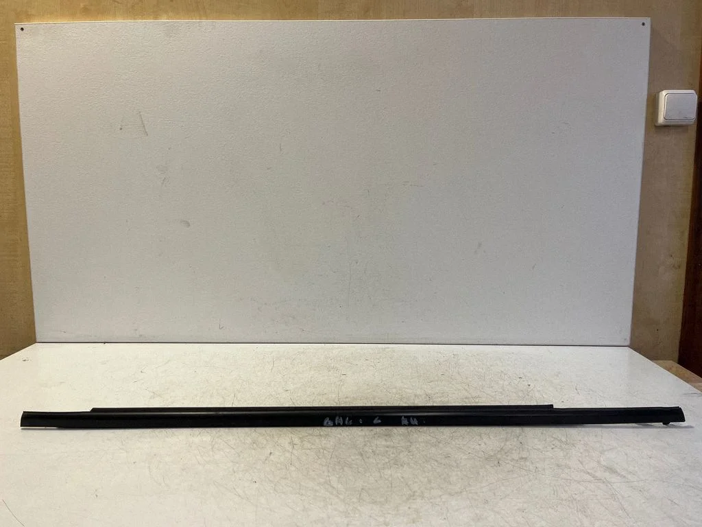 Rear door glass trim molding – left