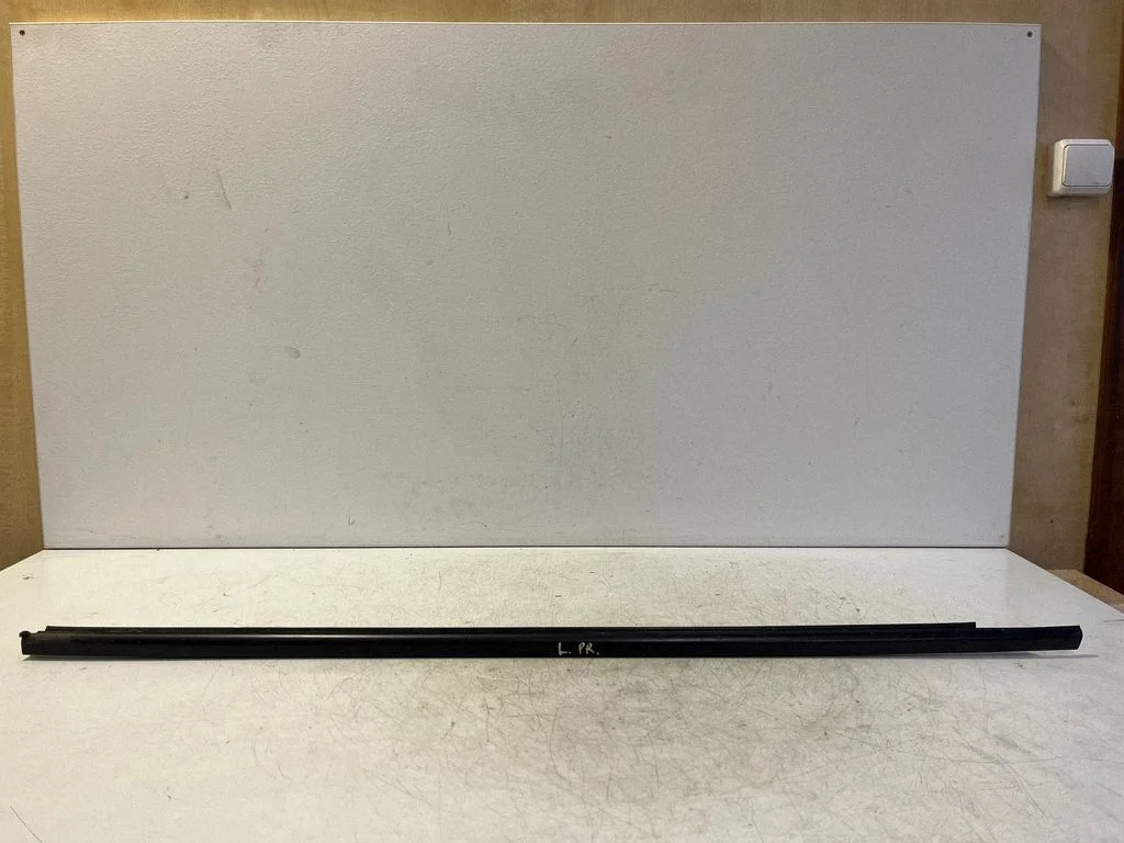 Front door glass trim molding – left