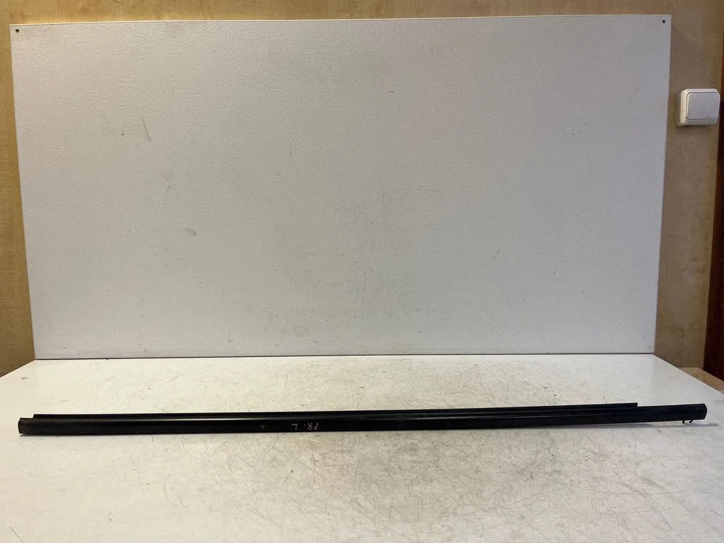 Front door glass trim molding – left
