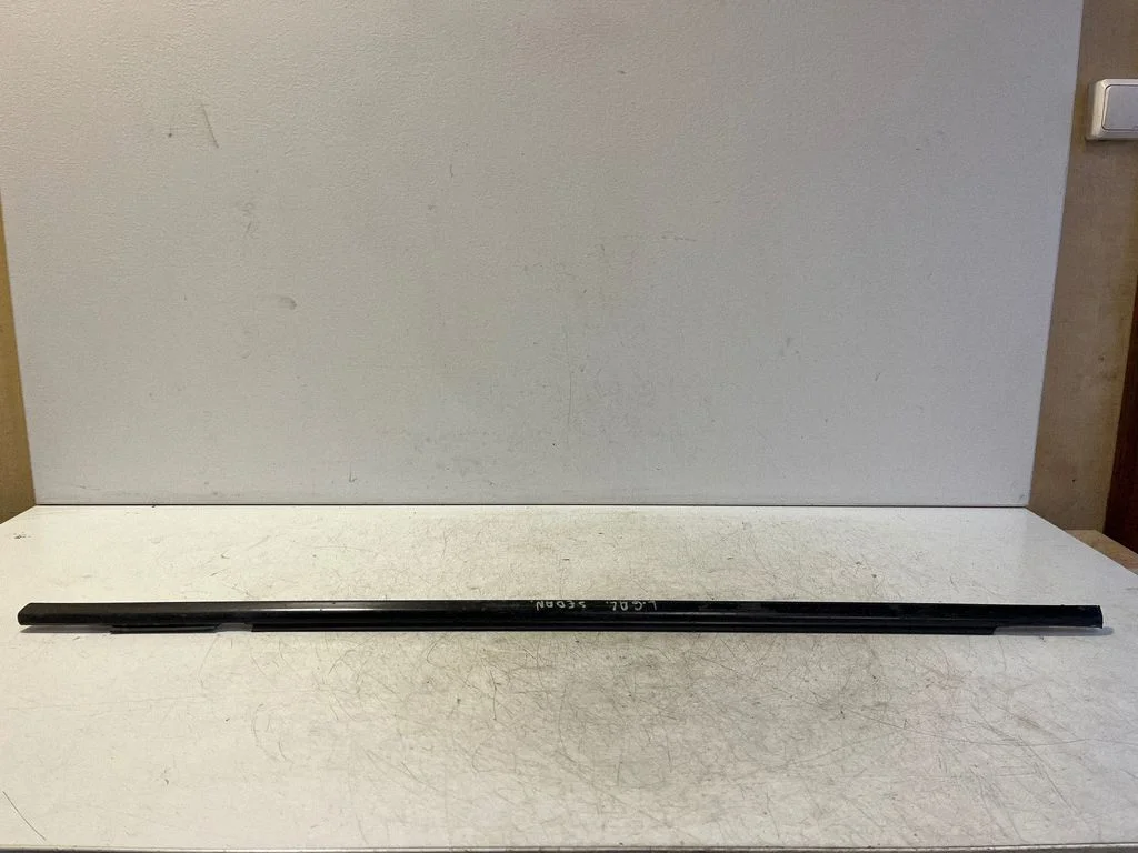 Rear door glass trim molding – left