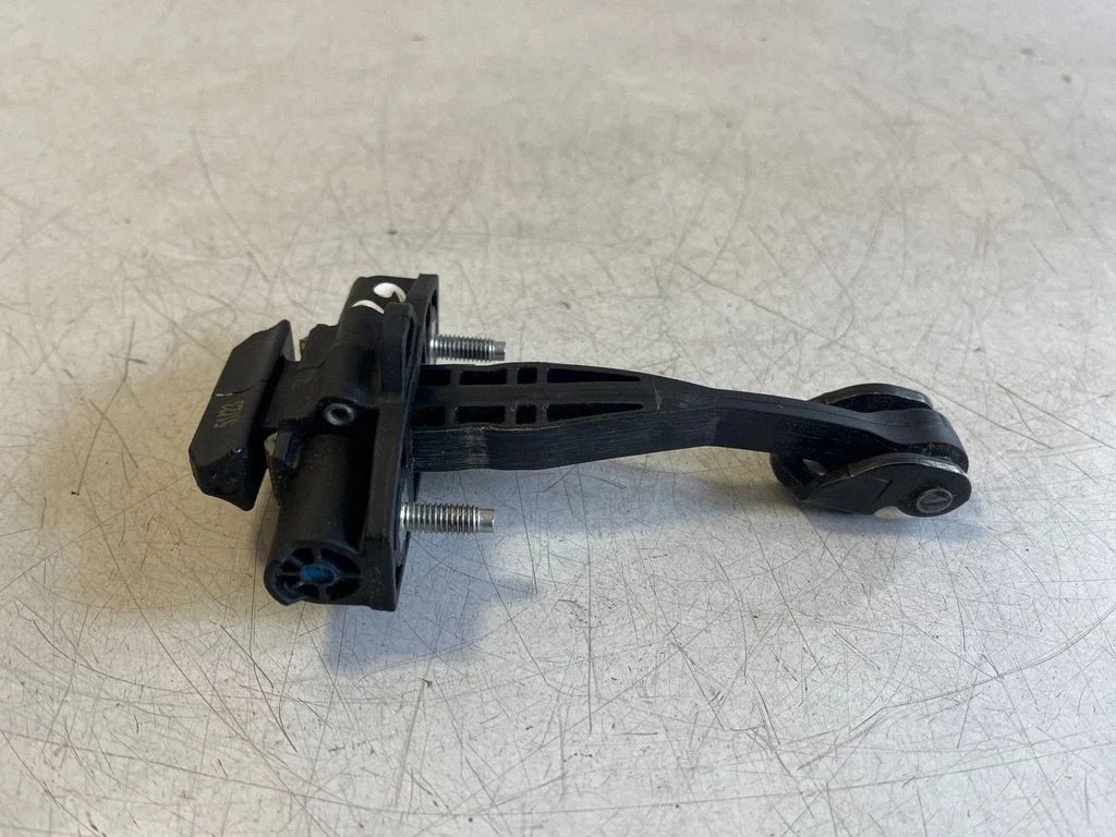 Rear door check strap stopper – Ford Ranger IV (2022-)